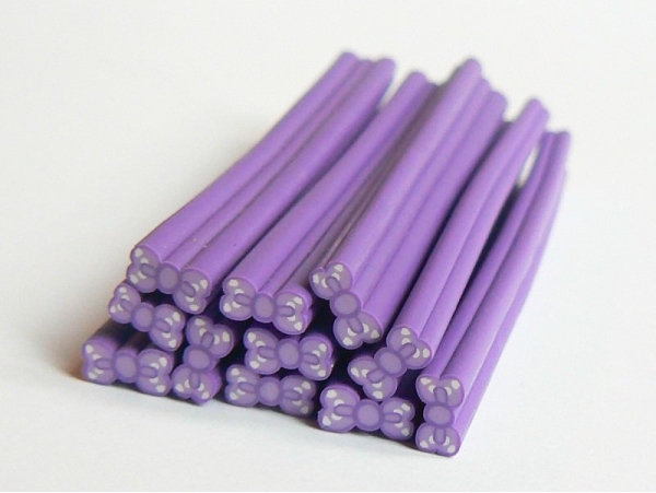 Acheter Cane noeud violet à pois- modelage et pâte fimo - 0,49 € en ligne sur La Petite Epicerie - Loisirs créatifs