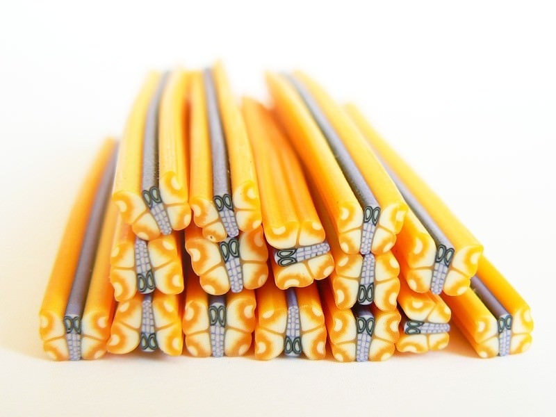 Acheter Cane papillon jaune en pâte fimo - 0,49 € en ligne sur La Petite Epicerie - Loisirs créatifs