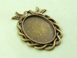 Acheter 1 support de cabochon bronze ovale à bord fantaisie oiseau - 36 mm - 1,39 € en ligne sur La Petite Epicerie - Loisirs...