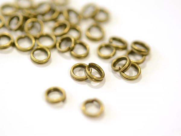 Acheter 100 anneaux doubles bronze - 5 mm - 0,59 € en ligne sur La Petite Epicerie - Loisirs créatifs