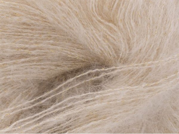 10 pelotes de grosse laine écru avec fil lurex