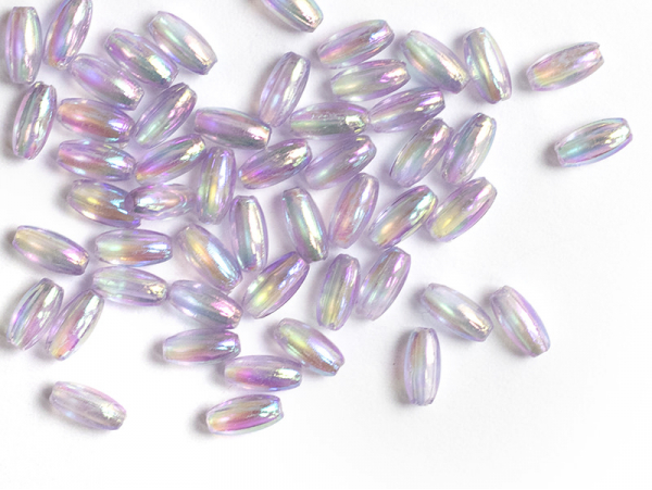 Acheter 50 perles en plastique - forme riz - mauve transparent irisé - 6x3 mm - 2,79 € en ligne sur La Petite Epicerie - Lois...