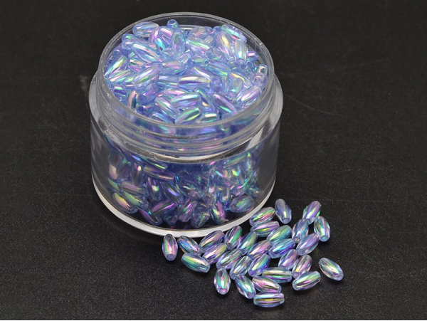 Acheter 50 perles en plastique - forme riz - bleu transparent irisé - 6x3 mm - 2,79 € en ligne sur La Petite Epicerie - Loisi...