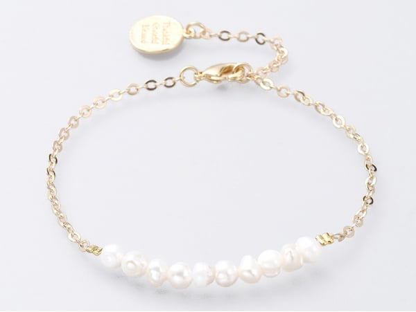 Bracelet avec véritables perles de culture et chaine doré à l'or