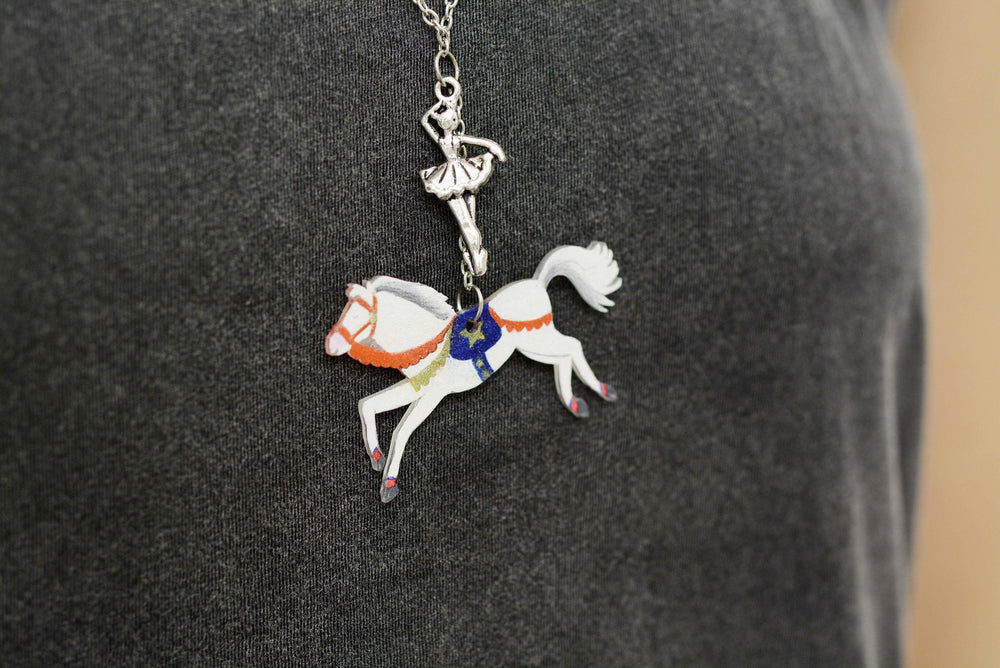 Cheval et son acrobate