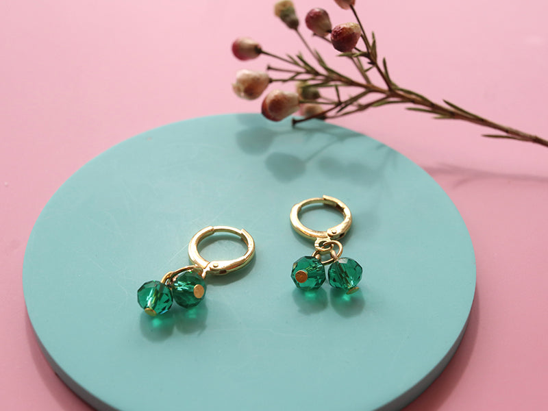 Les boucles d'oreilles duo de perles