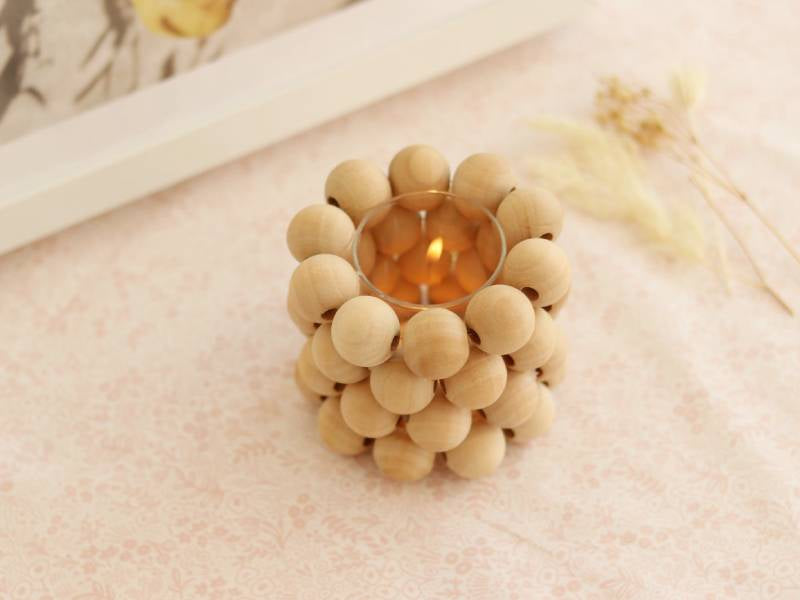 Le bougeoir en perles en bois