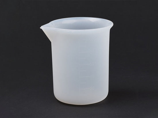 Achat Verre doseur avec bec verseur en silicone - 100 ml
