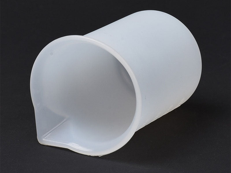 achat Verre doseur avec bec verseur en silicone - 100 ml