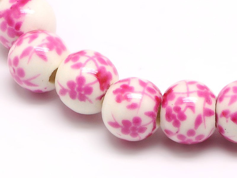 Achat Lot de 10 perles en porcelaine - fleurs roses - 6 mm