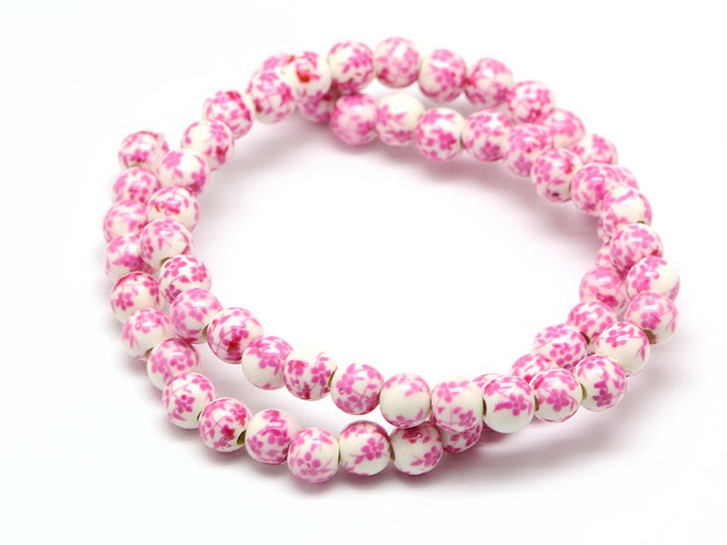Achat Lot de 10 perles en porcelaine - fleurs roses - 6 mm