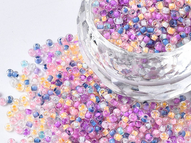 achat Perles de rocailles transparentes en tube - Mélange arc-en-ciel parme rosé - 2 mm