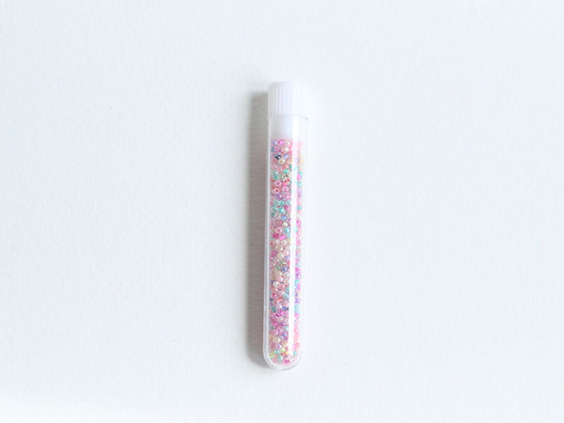 achat Perles de rocailles transparentes en tube - Mélange arc-en-ciel parme rosé - 2 mm