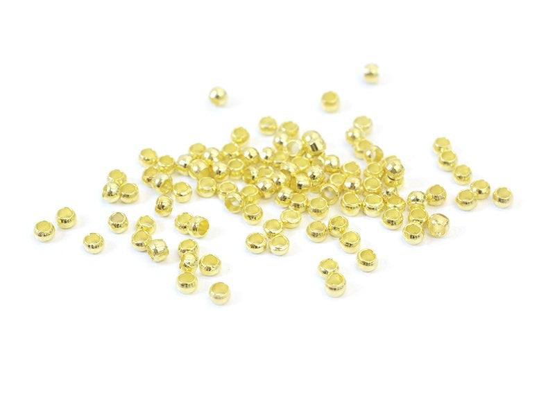 Achat 100 perles à écraser couleur or - 1 mm