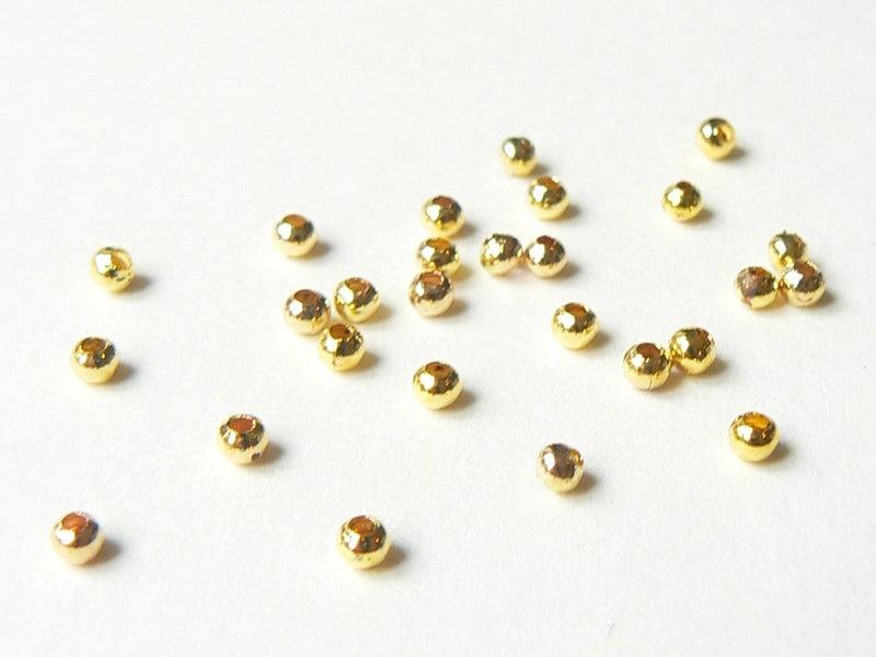 Achat 100 perles en métal dorées - 2,4 mm