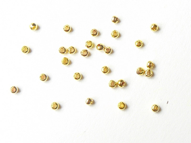 Achat 100 perles en métal dorées - 2,4 mm