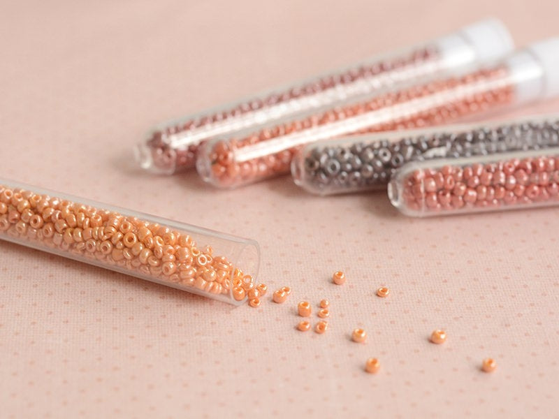 Achat Tube de 350 perles de rocailles opaques nacrées - orange clair