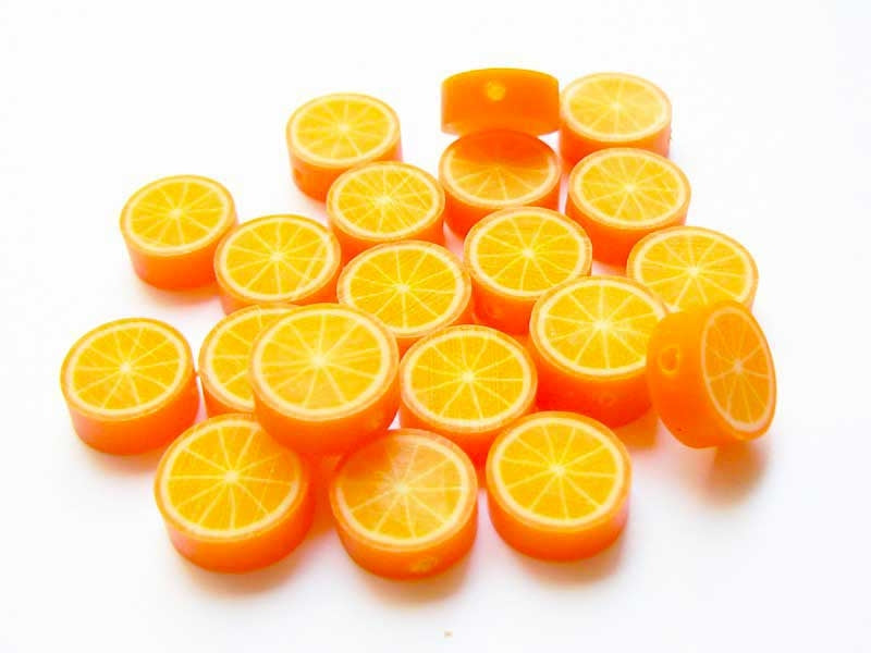 Achat 20 perles oranges en pâte polymère