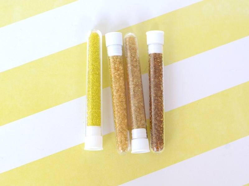 achat Tube de 350 perles transparentes - jaune
