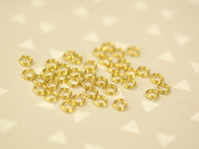 Achat 100 anneaux double couleur doré - 4 mm