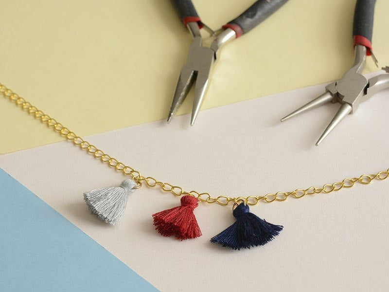 achat Pendentif pompon - rouge bordeaux