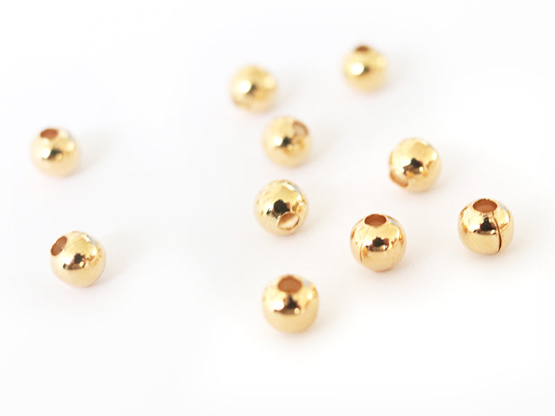 Achat Lot de 50 perles rondes 4mm  - dorées à l'or fin