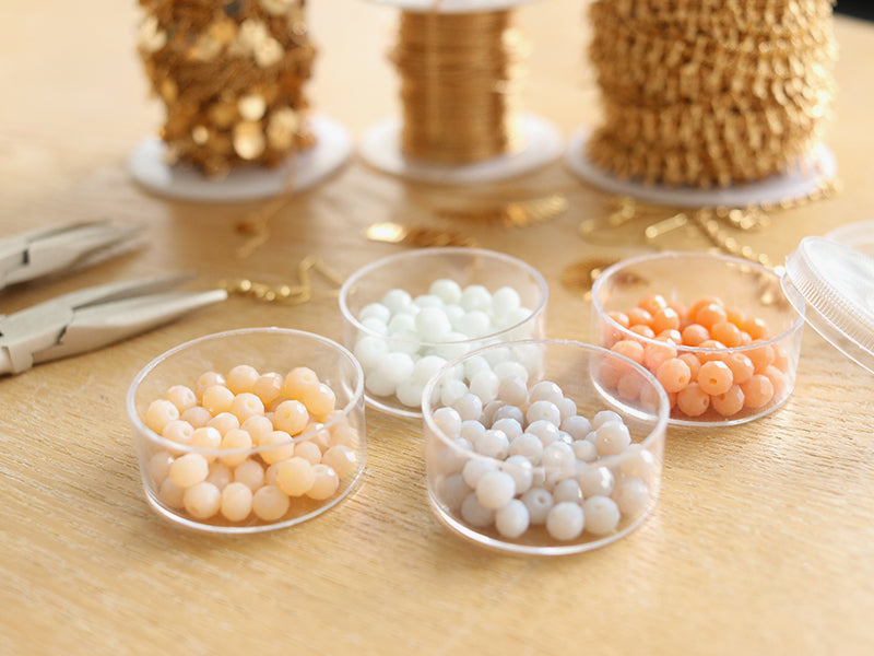 achat Lot de 50 perles à facettes en verre 4x6 mm - beige