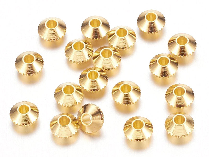 Achat 20 perles rondelles toupies ciselées en laiton doré - 4 mm
