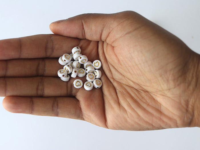 Achat Lot de 20 perles rondes - Coeurs dorés