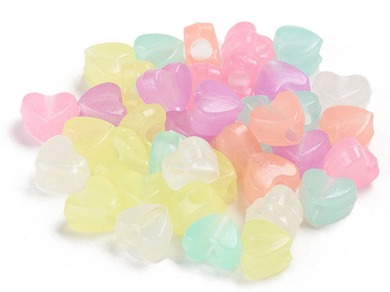achat 50 perles en plastique - cœurs - phosphorescent / brille dans le noir