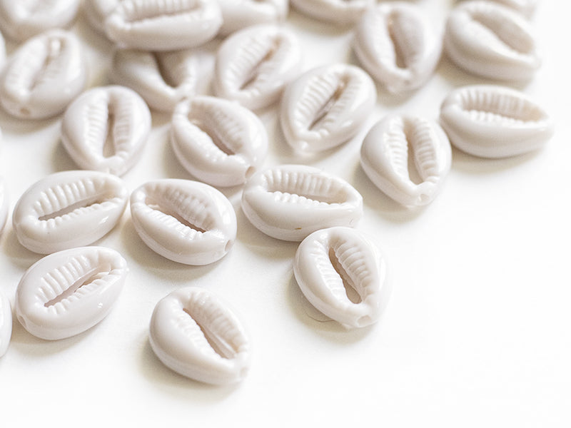 Achat 50 perles coquillages cauri en plastique - blanc