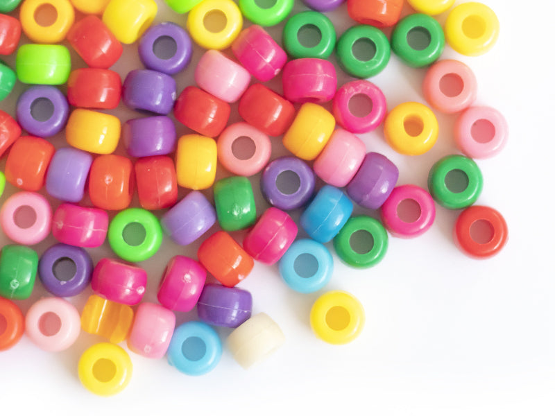 Achat 100 perles en plastiques basiques pour enfants - couleurs vives - 9x6 mm