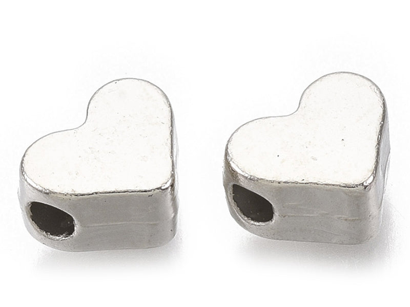 Achat 50 petites perles en plastique - cœurs argentés