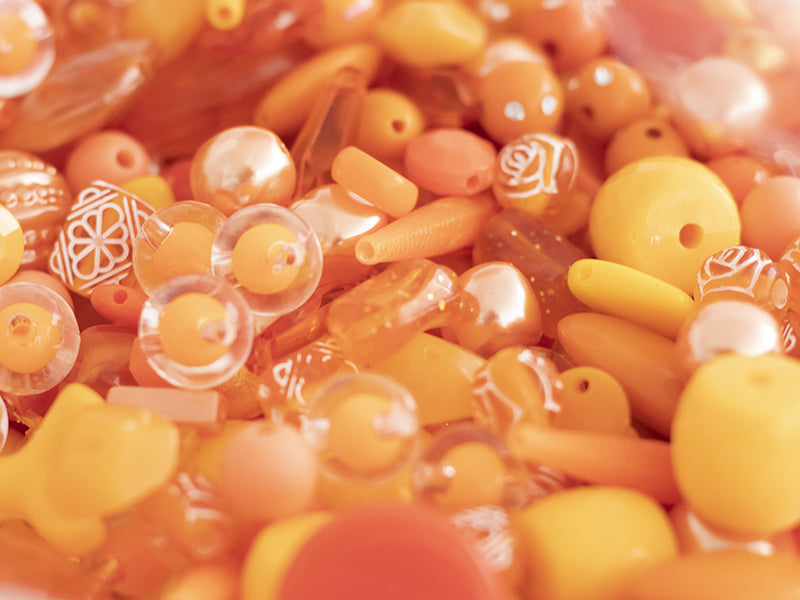 achat Pot de perles en plastique - nuances d'orange