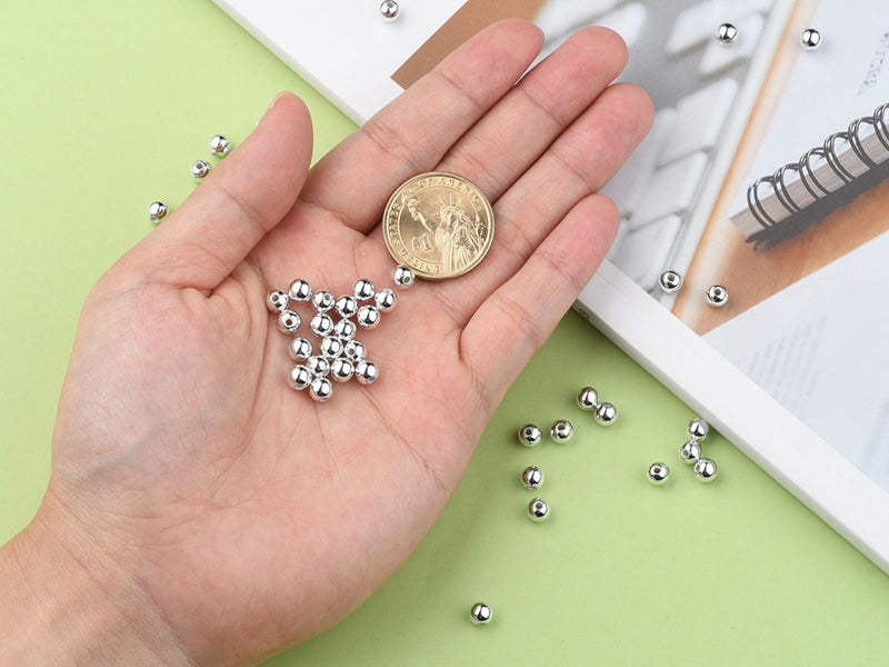 achat 100 perles en plastique rondes - 6 mm - argenté