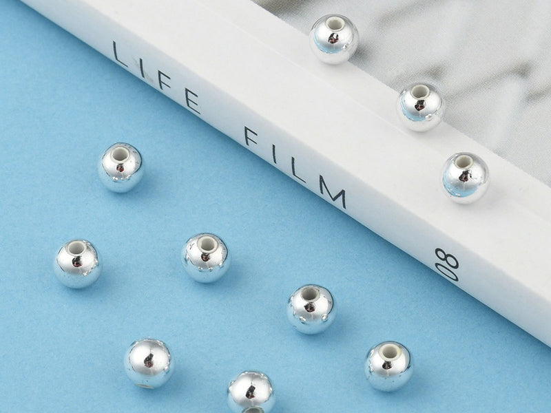 achat 100 perles en plastique rondes - 6 mm - argenté