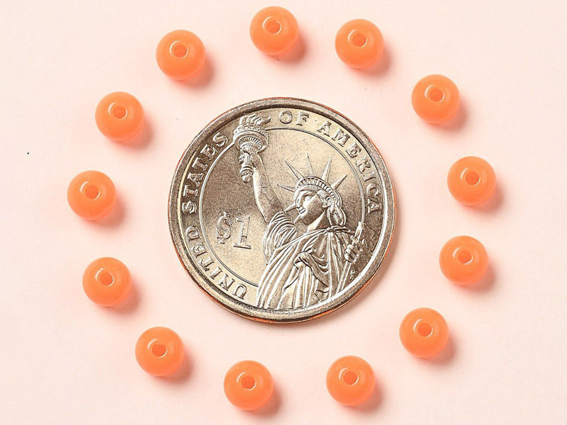 achat 100 perles en plastique rondes 6 mm - orange fluo