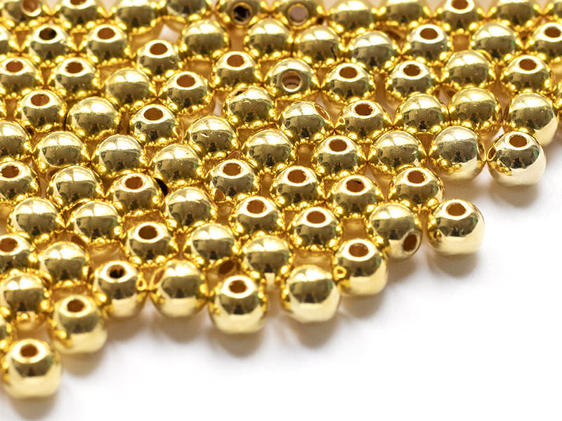 Achat 100 perles en plastique rondes - 6 mm - doré