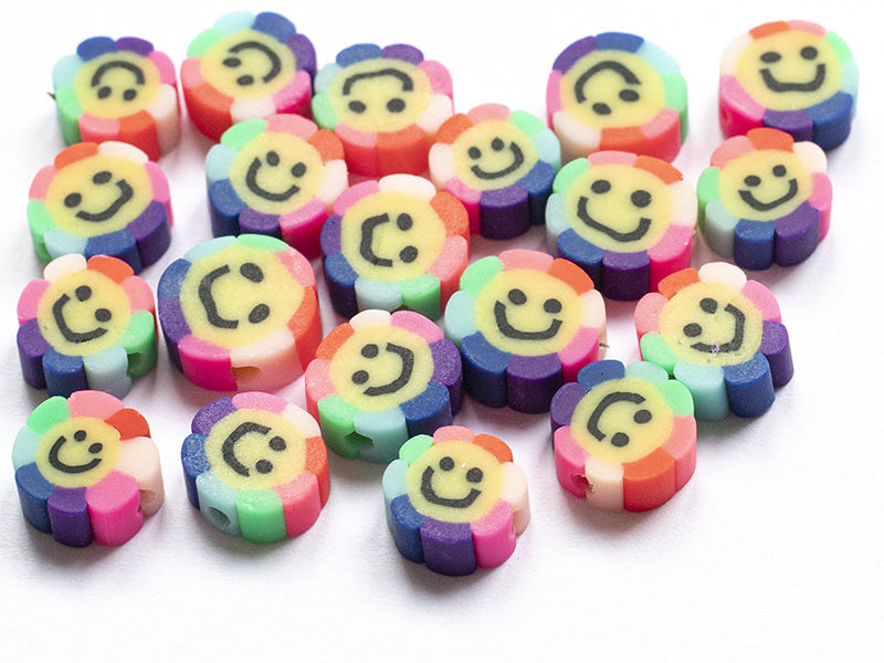 Achat 20 perles fleur sourire en pâte polymère - 9 mm