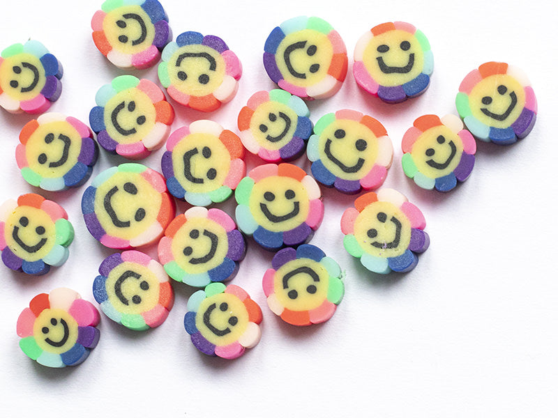 achat 20 perles fleur sourire en pâte polymère - 9 mm