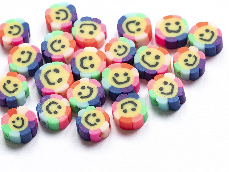 achat 20 perles fleur sourire en pâte polymère - 9 mm