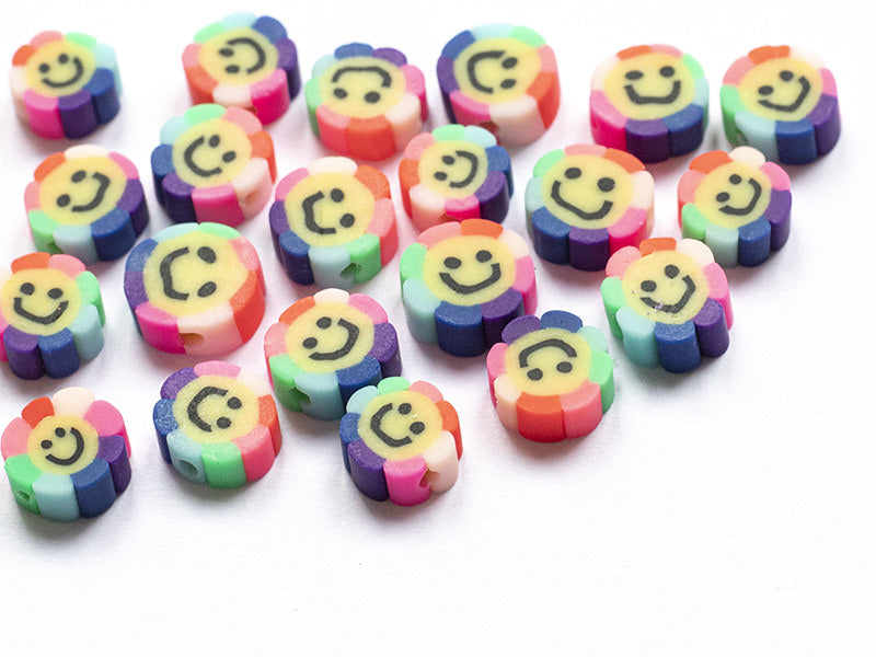 achat 20 perles fleur sourire en pâte polymère - 9 mm