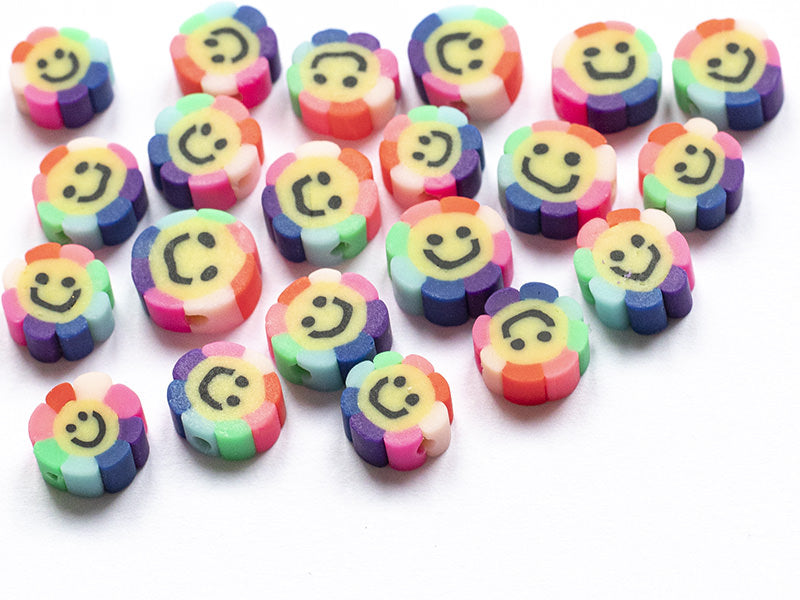 achat 20 perles fleur sourire en pâte polymère - 9 mm