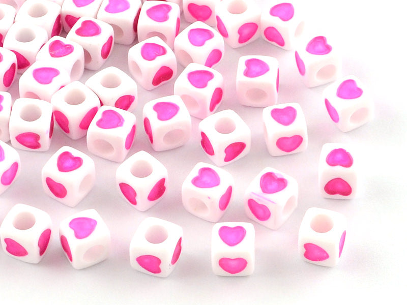 Achat 20 perles en plastique cubes symbole coeur  - rose flashy - 7 mm