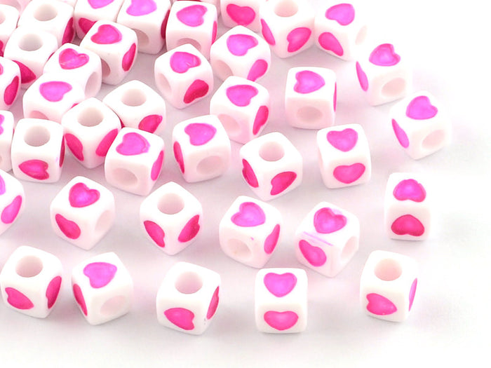 Achat 20 perles en plastique cubes symbole coeur  - rose flashy - 7 mm