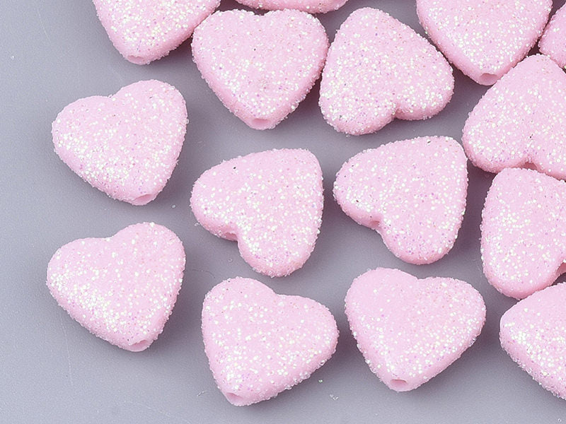 Achat 50 perles en plastique - coeur rose pailletté - 12 mm
