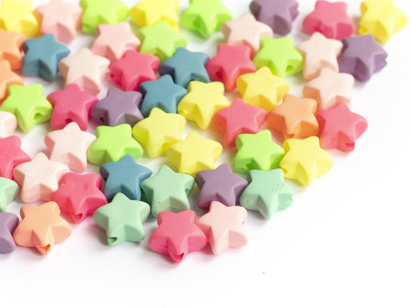 achat 50 perles en plastique - étoiles  - multicolore fluorescent - 11 mm