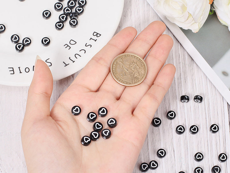achat 20 perles rondes en plastique - cœurs - noir et blanc