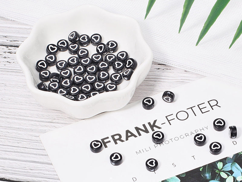 achat 20 perles rondes en plastique - cœurs - noir et blanc