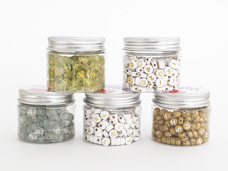 achat Pot perles symboles et chiffres  - Blanc